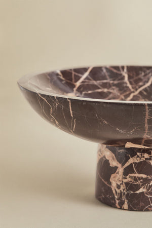 Close-up of Korinza cherry red marble bowl
