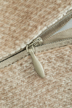 Lesoto bolster cushion – close-up of invisible zipper on beige velvet cover, white inner lining visible
