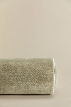 Lesoto bolster cushion – close-up of army green velvet fabric weave texture, macro detail