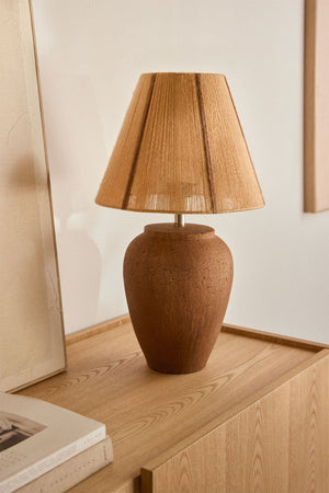Verena terracotta table lamp styled on a console