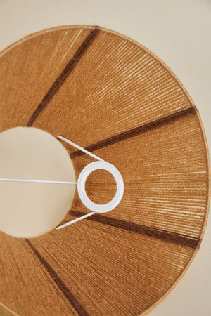 Detail of the Verena lamp's bulb fitting and terracotta base