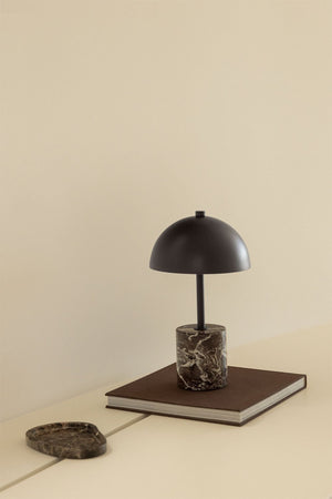 Nicolas wireless LED lamp – studio front view on beige background, matte black iron dome shade and marble base, full height visible