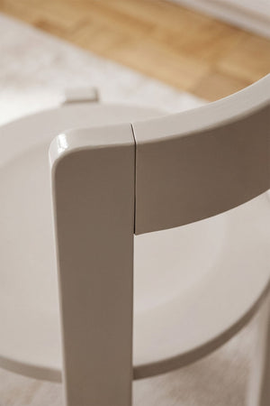 Noreli dining chair – three-quarter front view, Tapioca Beige, full chair visible