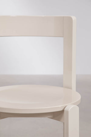Noreli dining chair – lifestyle shot in bright dining room with oak table, Natural Oak finish