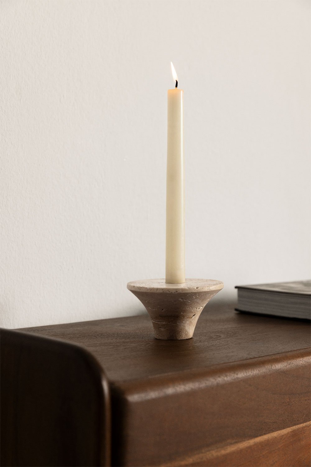 Bellvion travertine candle holder – full studio shot on warm beige background, no candle, showing inverted cone silhouette and pitted stone texture