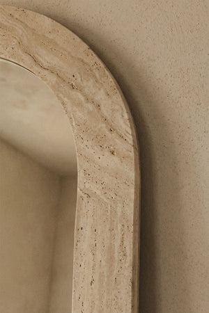 Alune arched mirror – three-quarter view leaning against white wall, full height