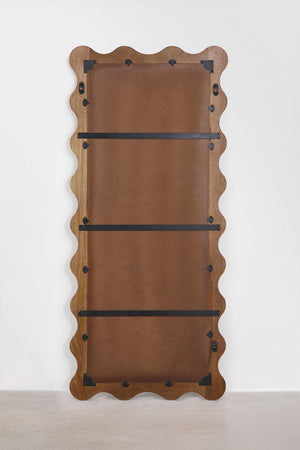 Bayaibe mirror – close-up of upper corner, Cherry Gold Red marble veining and scalloped frame detail