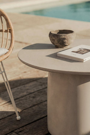 Close-up of the Layana concrete coffee table top and base