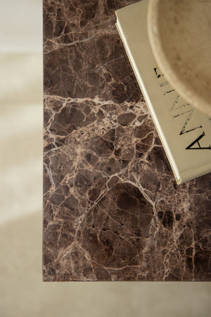Aluret marble accent table styled in an interior