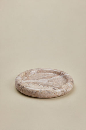 Velmar marble tray styled on a side table