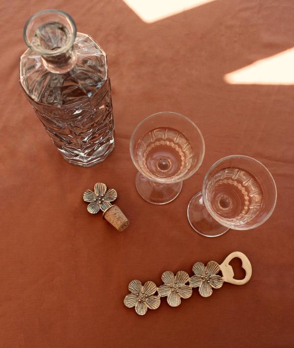 A La handmade flower brass bottle stopper 